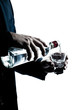 silhouette man hands close up pouring white alcohol