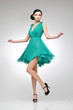 Photo: brunette in teal dress brunette in teal dress