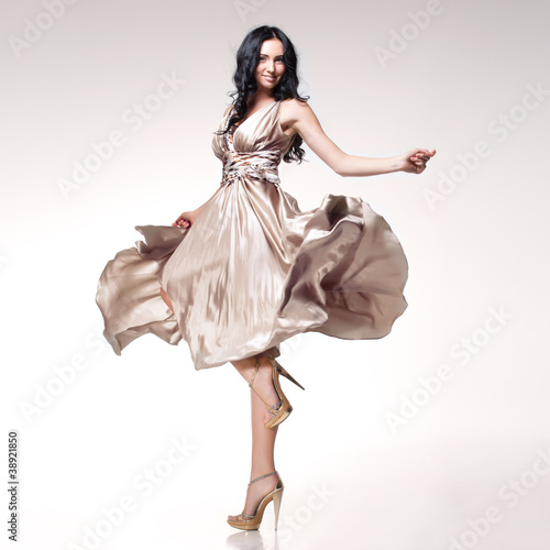 Photo: brunette in waving dress brunette in waving dress