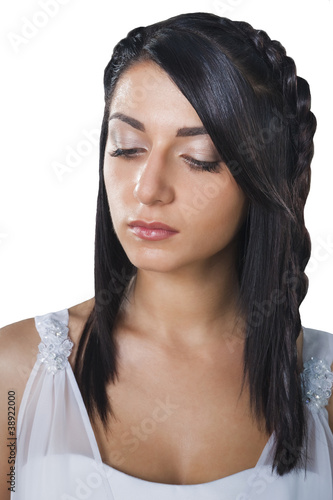 Photo: pensive brunette bride's face isolated on white background pensive brunette bride's face isolated on white background