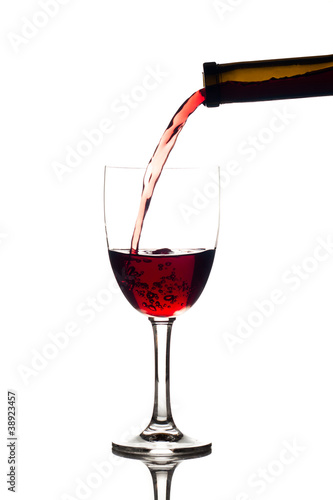 Photo: pouring red wine pouring red wine