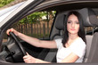 Photo: young brunette woman in new car young brunette woman in new car