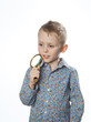 boy with magnifying glass