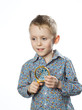 boy with magnifying glass