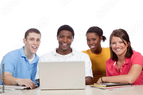 Photo: Multicultural College Students/Friends around a computer Multicultural College Students/Friends around a computer