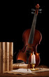old used violin with antique items
