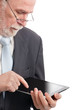 Photo: Senior with tablet pc Senior with tablet pc