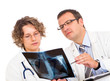 Two doctors looking an x-ray image Two doctors looking an x-ray image