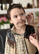 Junge als Cowboy