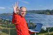 engineer using laptop at solar panels plant field engineer using laptop at solar panels plant field