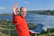 engineer using laptop at solar panels plant field engineer using laptop at solar panels plant field