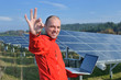 engineer using laptop at solar panels plant field engineer using laptop at solar panels plant field