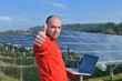 engineer using laptop at solar panels plant field engineer using laptop at solar panels plant field