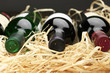 Photo: Wine bottles in straw Wine bottles in straw