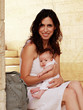 Foto: Fashionable young mother with her little baby Fashionable young mother with her little baby
