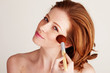 Applying Blusher To Cheekbone