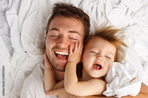 Photo: Father and daughter laughing and bonding Father and daughter laughing and bonding