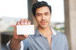 Photo: businessman with business card businessman with business card