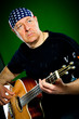 man with a guitar, bass player