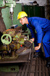 industrial machinist operating machine tool