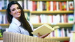 smiling female student with book