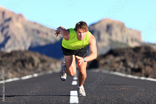 Photo: Sprinter running on road Sprinter running on road