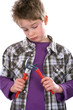 Foto: boy is looking skeptical on his tongs boy is looking skeptical on his tongs