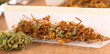 Photo: Rolling a joint out of marijuana and tobacco Rolling a joint out of marijuana and tobacco