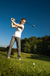 playing golf