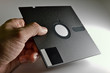 hand holding Diskette of 5,25 inches