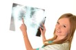 Female doctor examining an x-ray