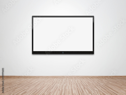 Photo: Blank TV at the wall with clipping path for the screen Blank TV at the wall with clipping path for the screen
