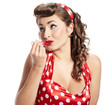 Pin-up  woman applying her make-up