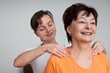 Photo: Senior fitness woman receiving massage at home Senior fitness woman receiving massage at home