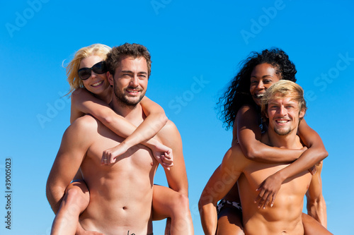 Photo: Friends in vacation at the beach Friends in vacation at the beach