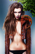 pretty beautiful erotic woman with chameleon under tree pretty beautiful erotic woman with chameleon under tree