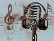 Microphone with headphones on background