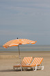 Beach chairs and umbrella