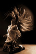 cool woman dancer against black background cool woman dancer against black background
