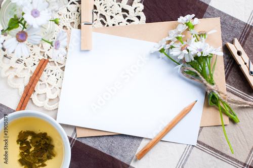 Photo: empty cardboard card with flowers empty cardboard card with flowers