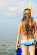 The girl on seacoast looks in a distance The girl on seacoast looks in a distance