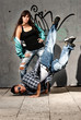 Photo: Young urban couple dancers hip hop dancing urban scene Young urban couple dancers hip hop dancing urban scene