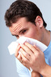 Sneezing man having cold.