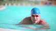 Video: Young swimmer in breaststroke; Full HD Photo JPEG Young swimmer in breaststroke; Full HD Photo JPEG