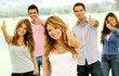 People with thumbs up