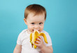Baby eating a banana