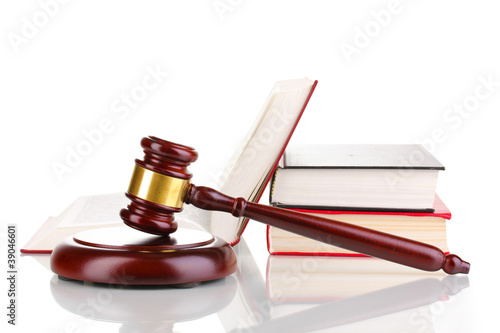 Photo: Judge's gavel and books isolated on white Judge's gavel and books isolated on white