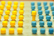 Pegs of logic game ordered in rows for different concepts.