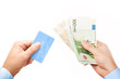 Photo: Concept "Cash or Card?" - hands holding credit card and money Concept "Cash or Card?" - hands holding credit card and money