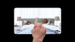 Hand scrolling vertically through family videos on touch screen